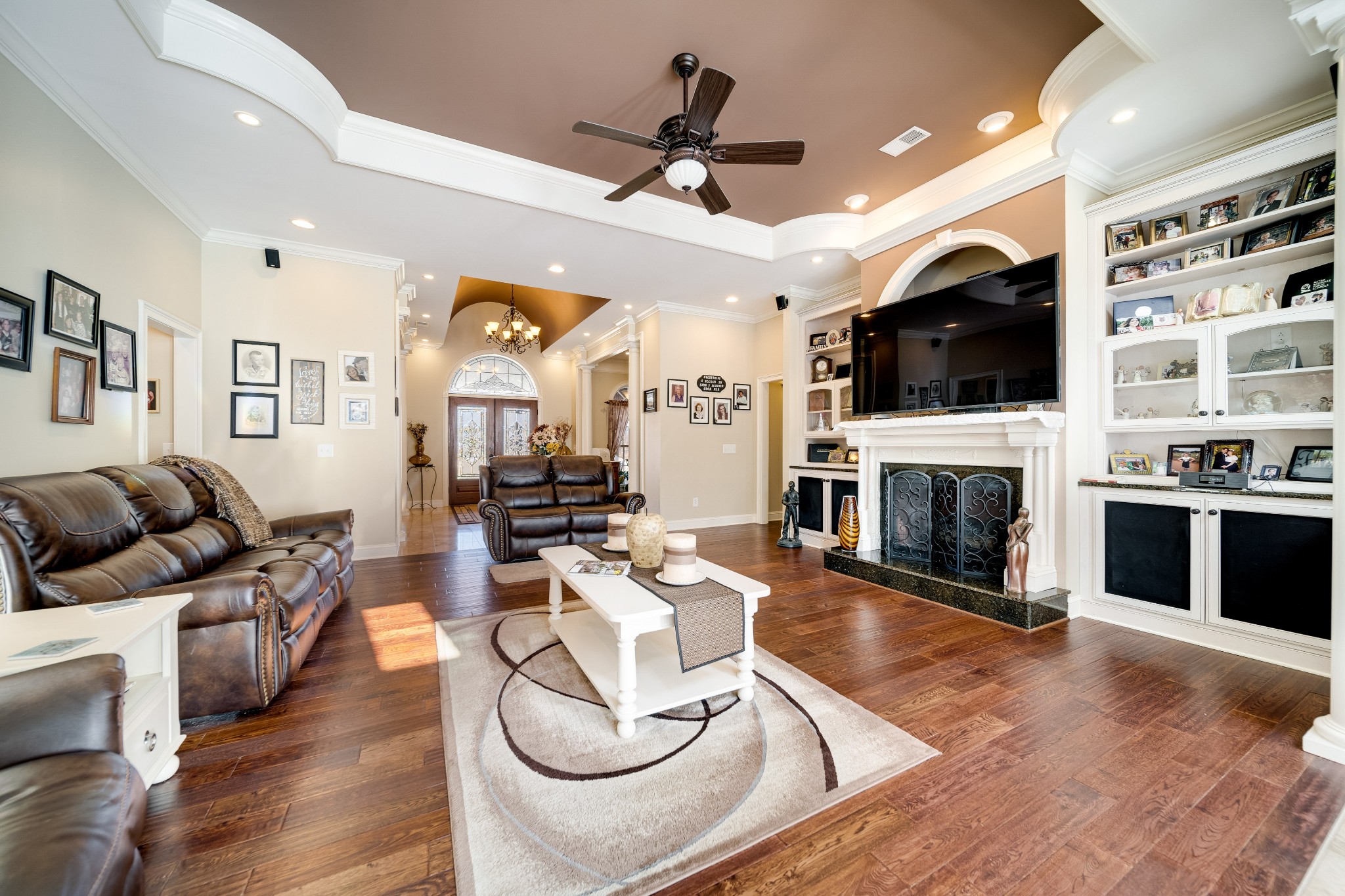 236 Raymond Hodges Road Cottontown, TN 37048 - Photo 32 of 37 a living room with furniture fireplace and flat screen tv