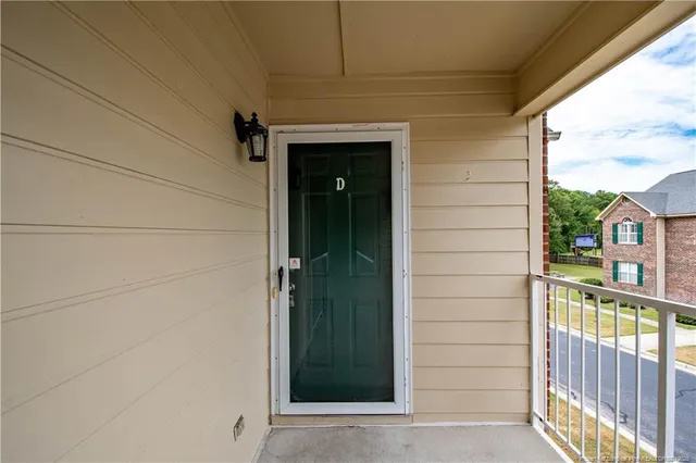a view of a door and a window