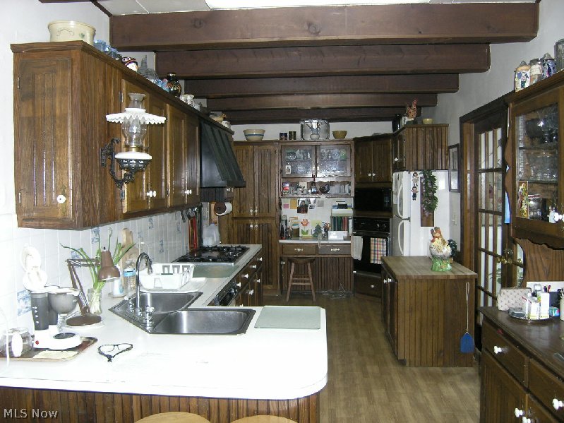 1774 Dodgeville Road Rome, OH 44085 - Photo 6 of 13 9 x 19 kitchen, laminate floors