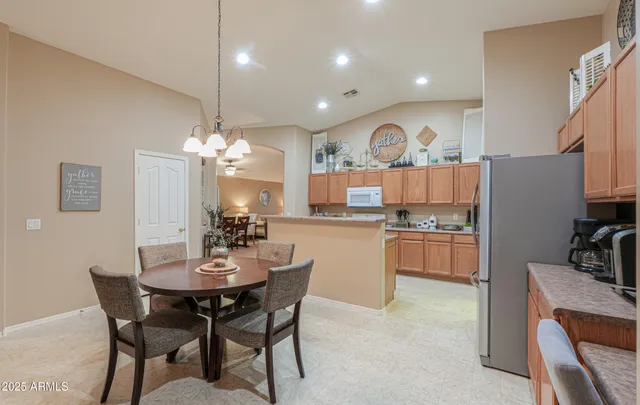 a view of a dining room with furniture