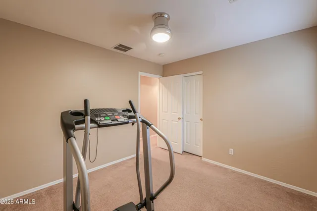 a view of a hallway with windows