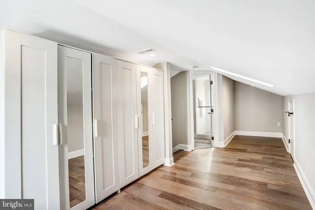 a view of entryway with wooden floor