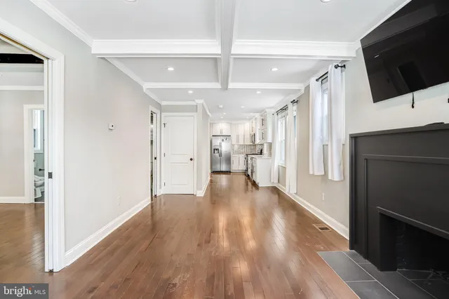 a view of a livingroom with wooden floor