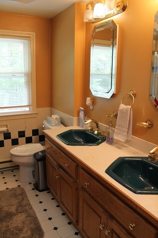 230 West Sutton Road Sutton, MA 01590 - Photo 16 of 28 a kitchen with a sink cabinets and window