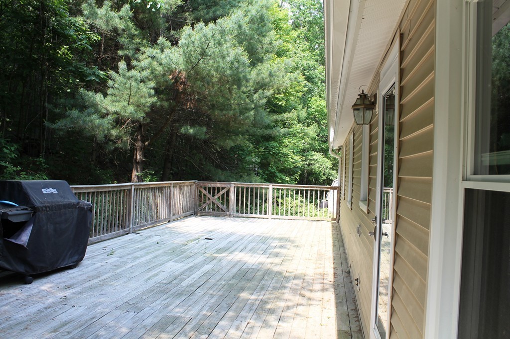 230 West Sutton Road Sutton, MA 01590 - Photo 4 of 28 a view of balcony with furniture