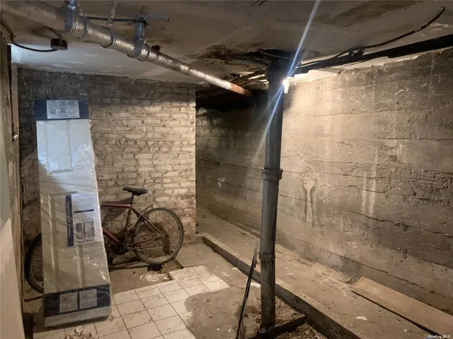 a front view of a house with parking space