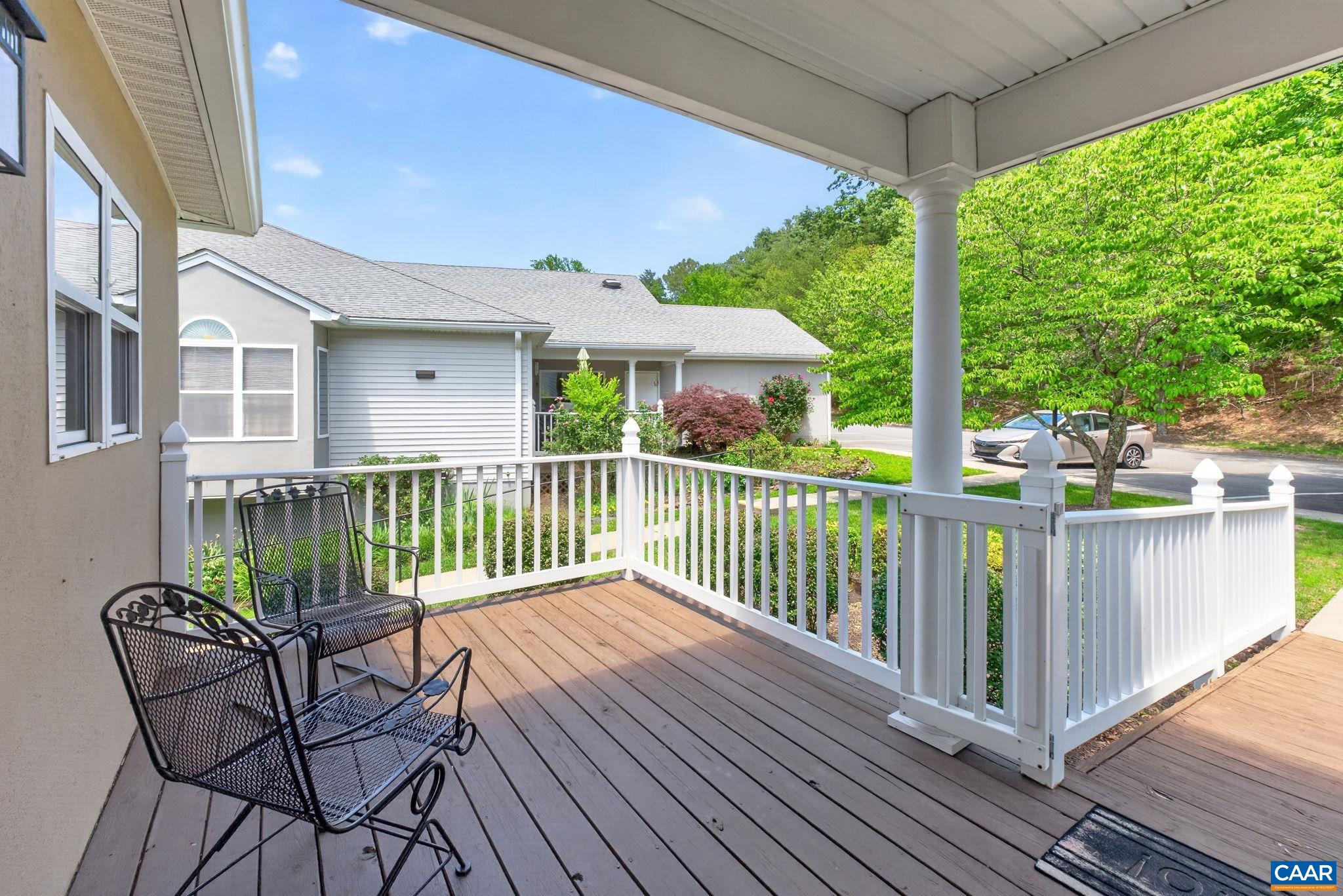 590 Mockingbird Way Charlottesville, VA 22901 - Photo 3 of 43 a view of a chair and tables in the balcony