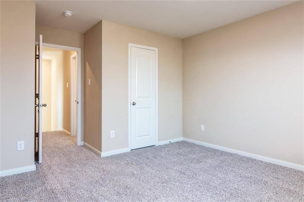 216 Lake Ridge Princeton, TX 75407 - Photo 11 of 20 an empty room with closet and a bathroom