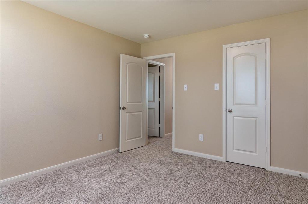 216 Lake Ridge Princeton, TX 75407 - Photo 13 of 20 an empty room with closet area