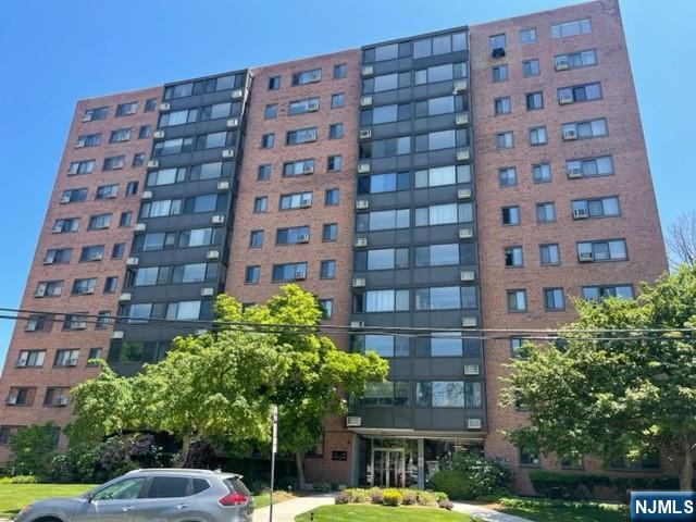 90 Prospect Avenue, Unit 8E Hackensack, NJ 07601 - Photo 1 of 21 a front view of a building