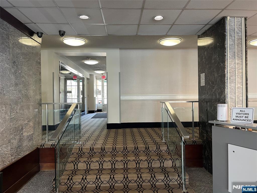 90 Prospect Avenue, Unit 8E Hackensack, NJ 07601 - Photo 17 of 21 a very nice looking room with a large window