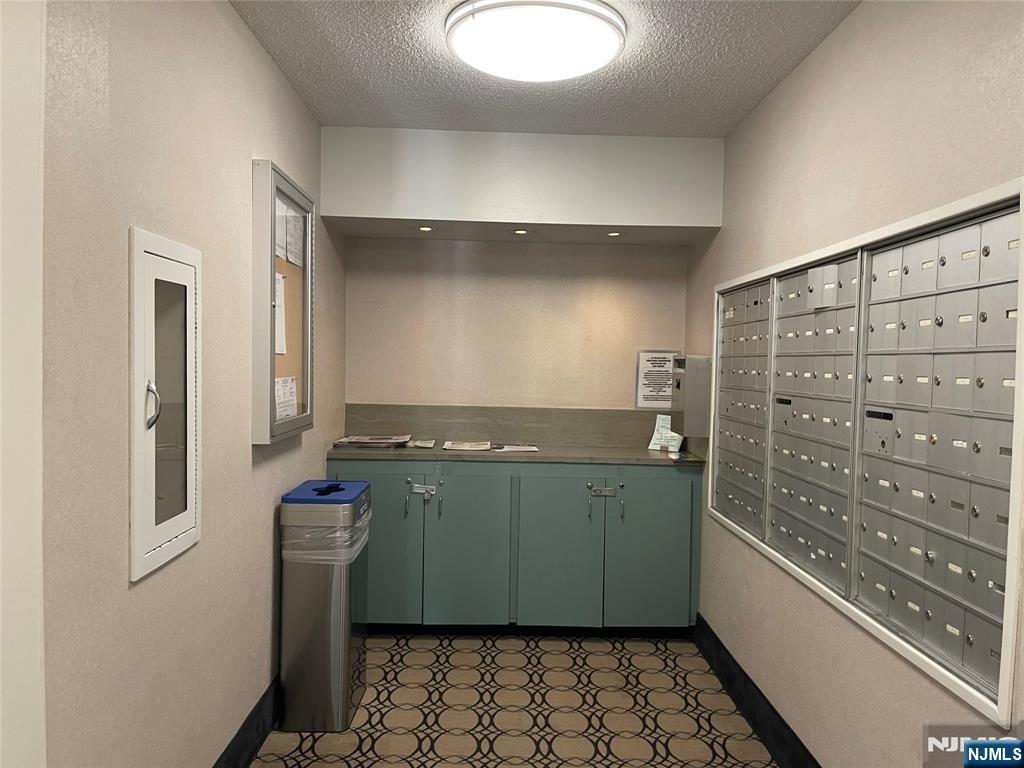 90 Prospect Avenue, Unit 8E Hackensack, NJ 07601 - Photo 19 of 21 a room with storage and utility