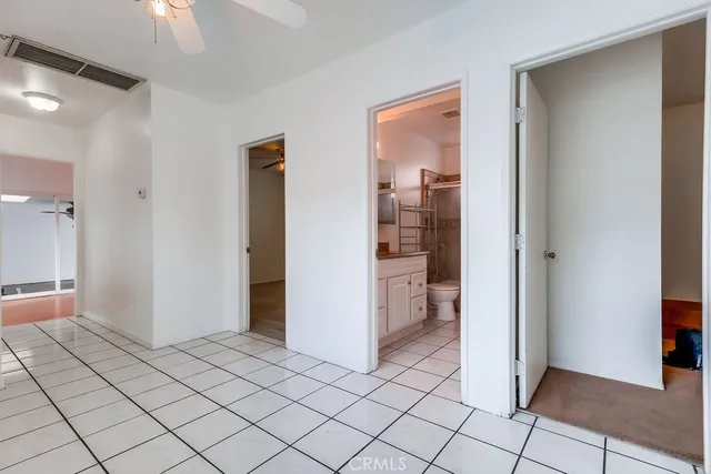 a view of an empty room and window in a room