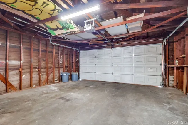 a view of a room with wooden walls