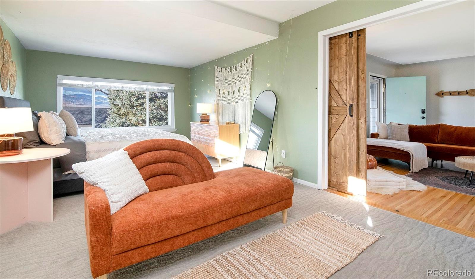 6480 Garrison Street Arvada, CO 80004 - Photo 17 of 40 a living room with furniture and a large window