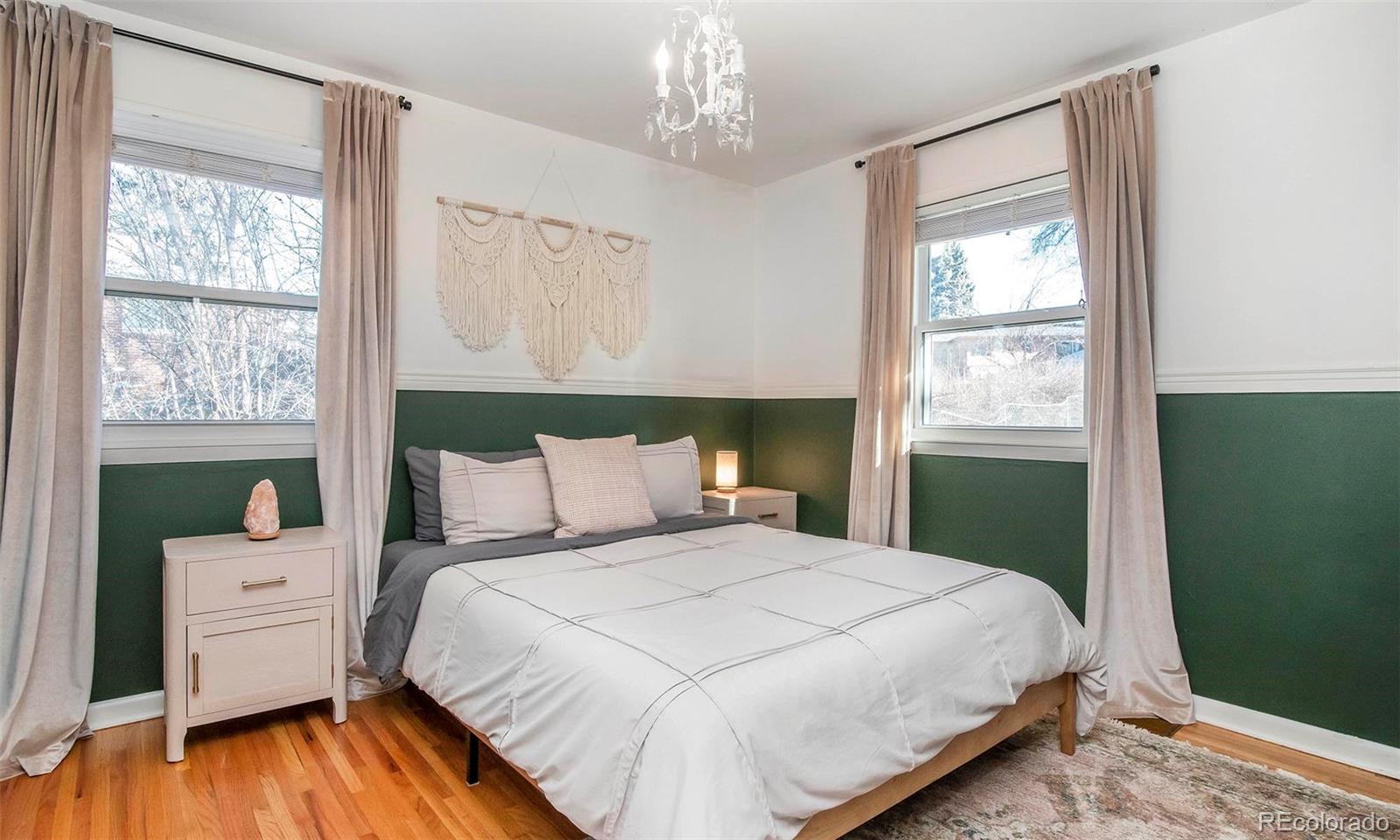 6480 Garrison Street Arvada, CO 80004 - Photo 23 of 40 a bedroom with a bed and window