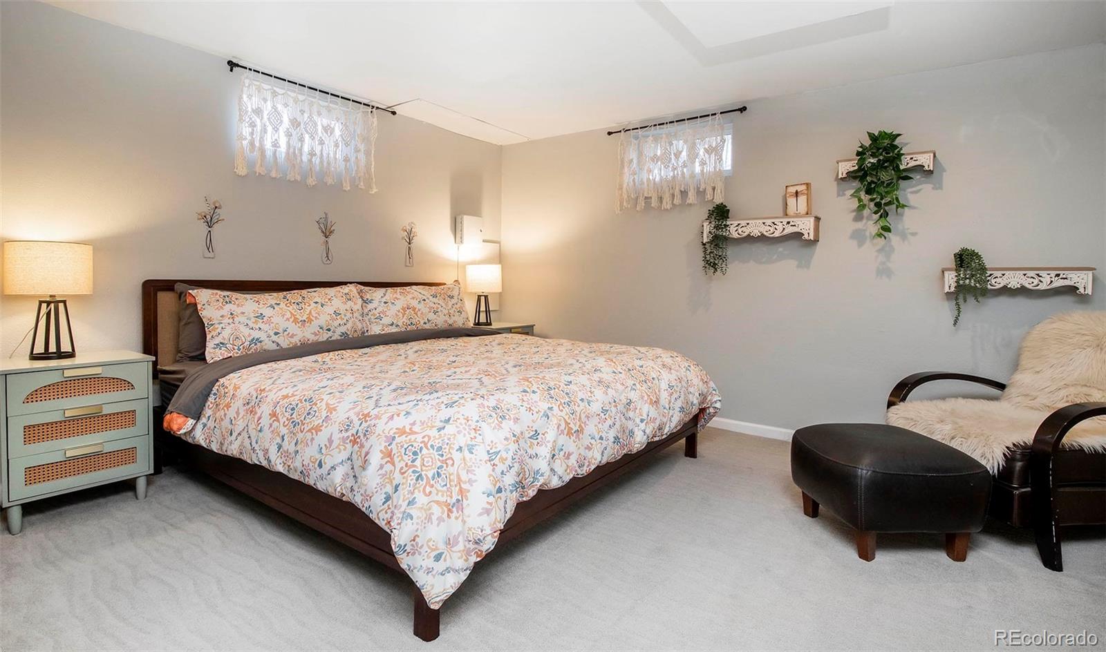 6480 Garrison Street Arvada, CO 80004 - Photo 27 of 40 a bedroom with a bed and window