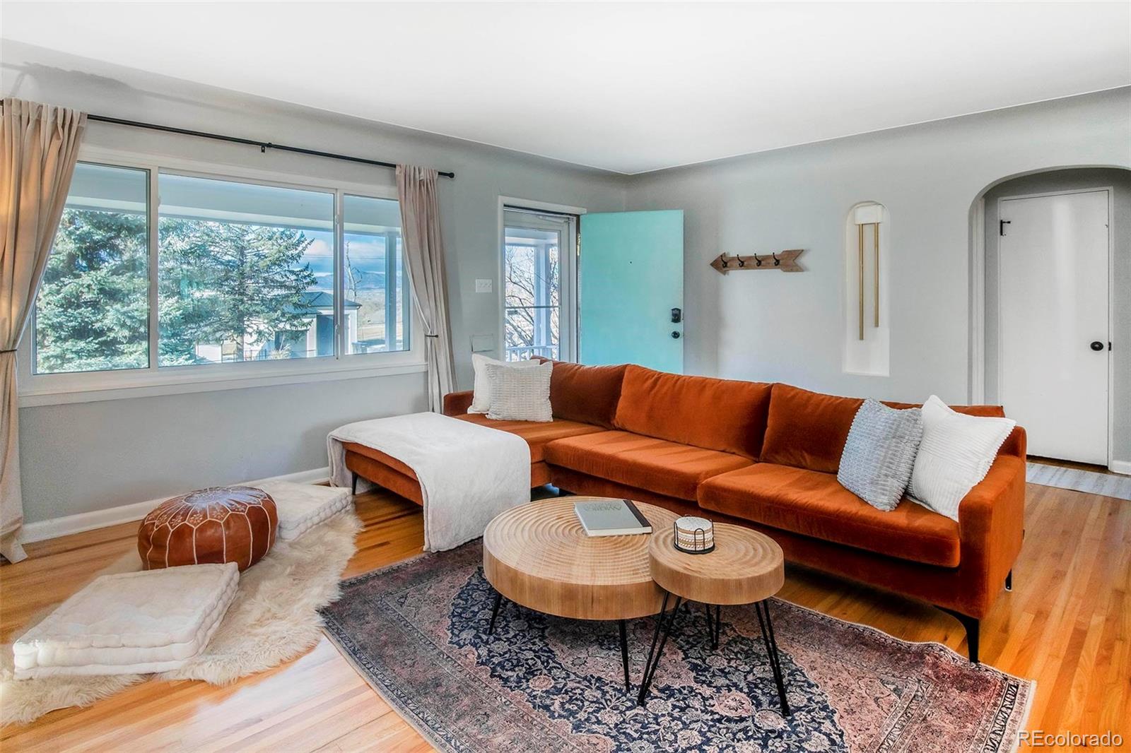 6480 Garrison Street Arvada, CO 80004 - Photo 7 of 40 a living room with furniture and a large window