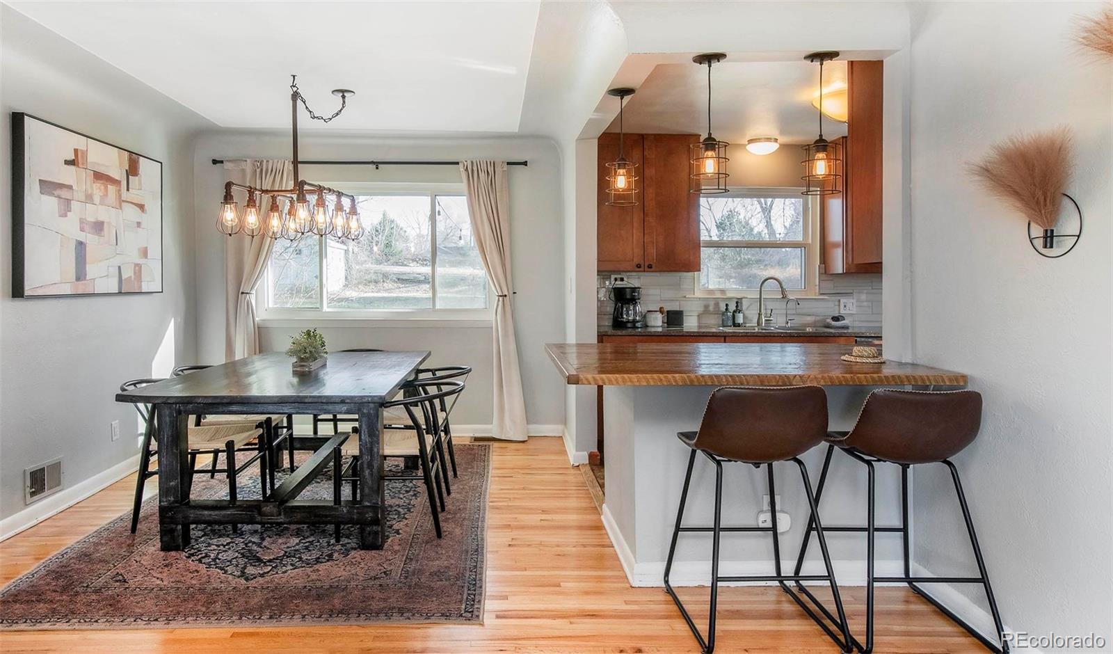 6480 Garrison Street Arvada, CO 80004 - Photo 8 of 40 a dining room with furniture and window