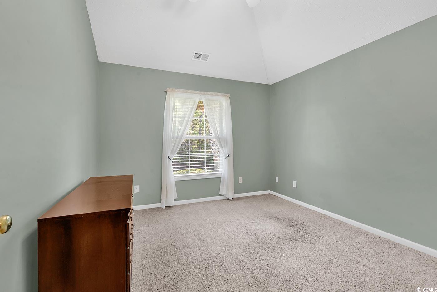 246 Catawba River Road Myrtle Beach, SC 29588 - Photo 14 of 27 Featuring carpet flooring, lofted ceiling, and ceiling fan