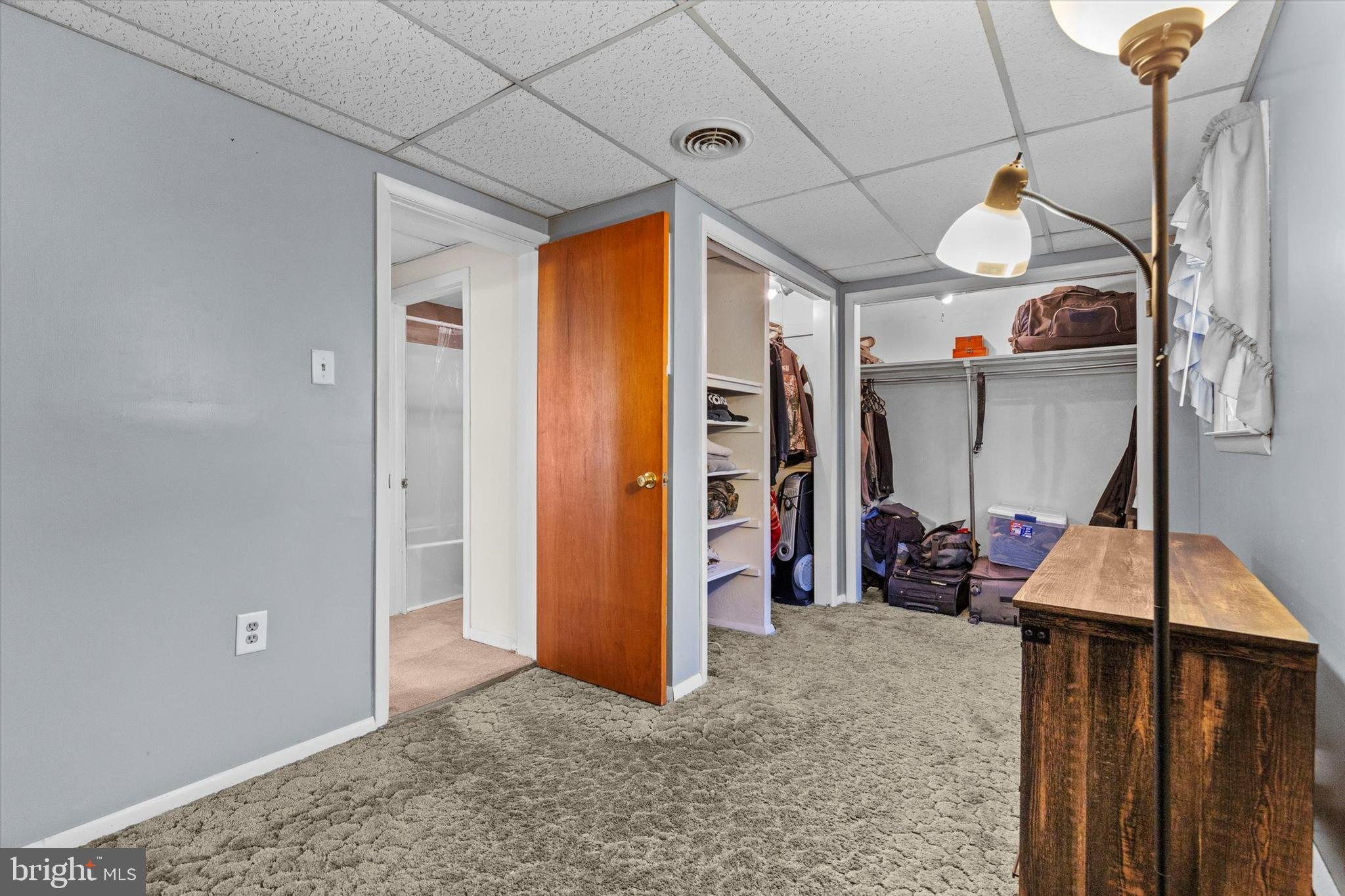 2689 Sheridan Road York, PA 17406 - Photo 14 of 28 a view of an empty room with wooden floor and a window