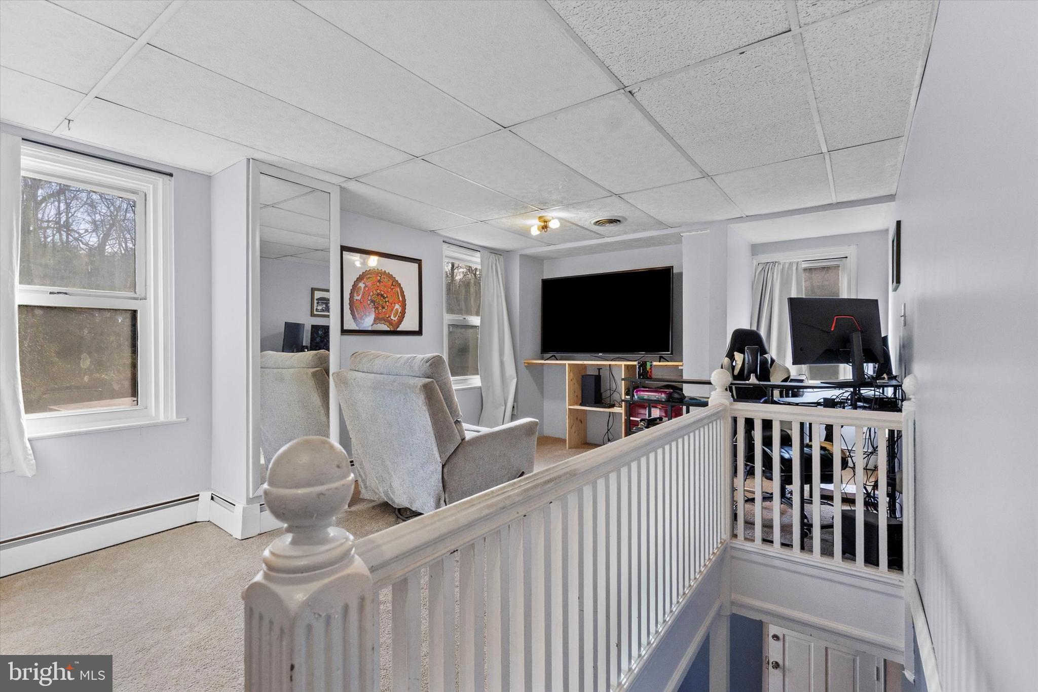 2689 Sheridan Road York, PA 17406 - Photo 19 of 28 a view of a livingroom with furniture a flat screen tv and a window