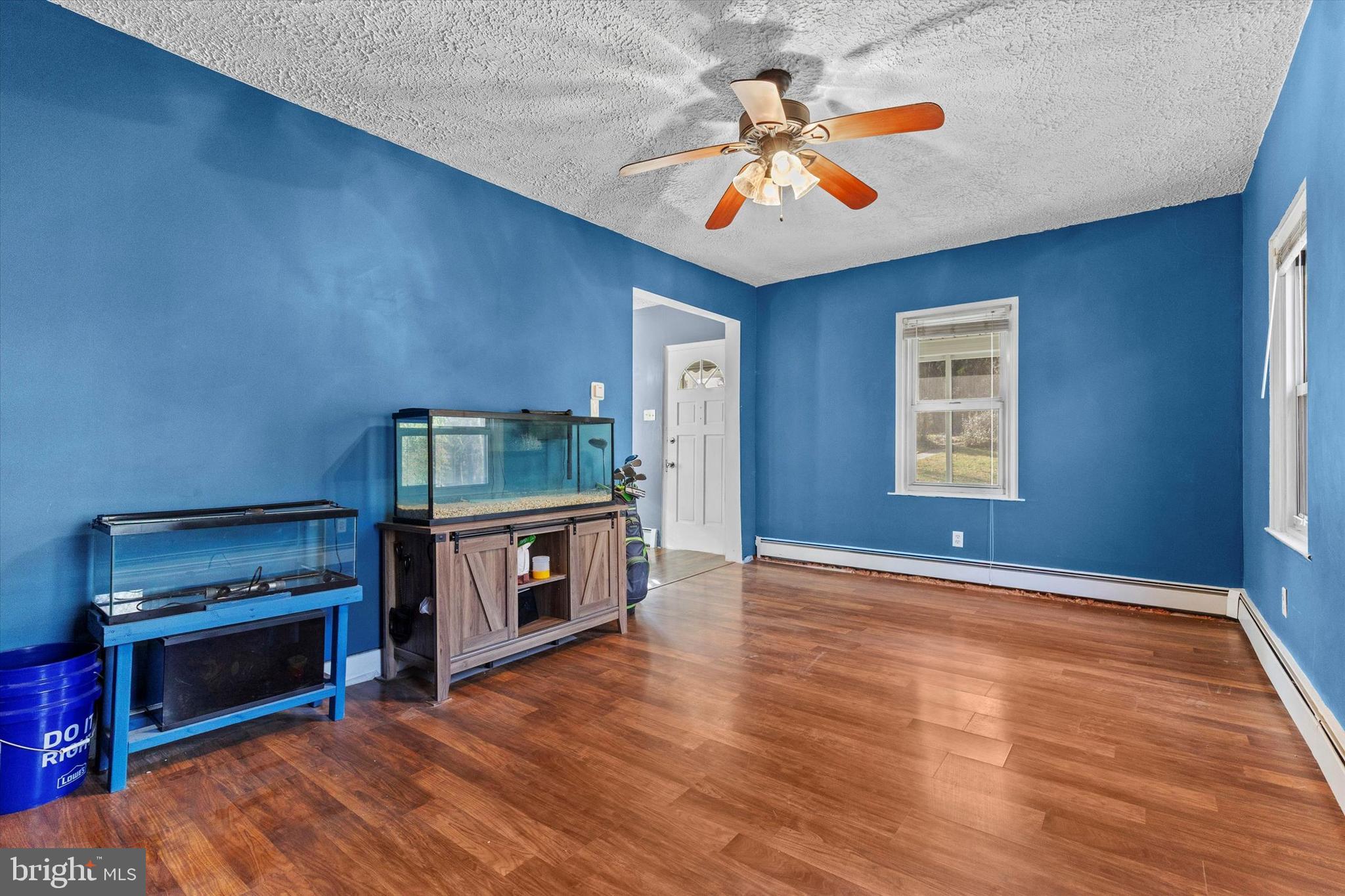 2689 Sheridan Road York, PA 17406 - Photo 20 of 28 a view of an empty room with a fireplace and a window