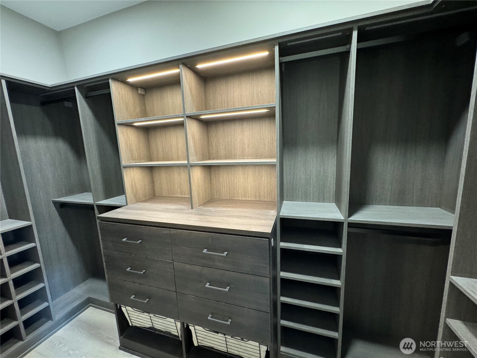 615 East Pike Street, Unit 402 Seattle, WA 98122 - Photo 15 of 31 a room with cabinets and closet