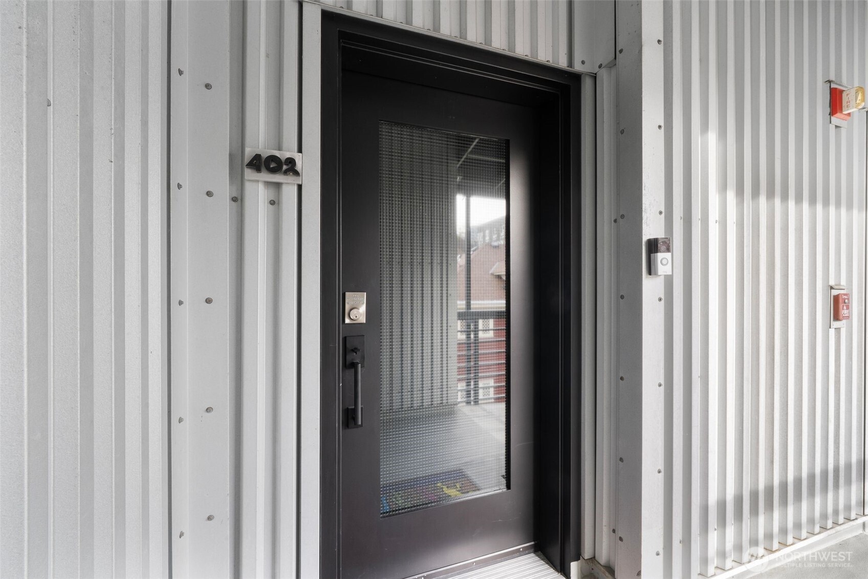 615 East Pike Street, Unit 402 Seattle, WA 98122 - Photo 25 of 31 a view of a wooden door