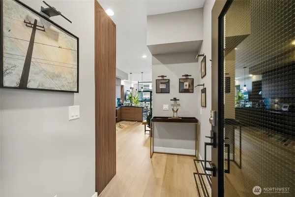 a kitchen with stainless steel appliances a refrigerator and a stove