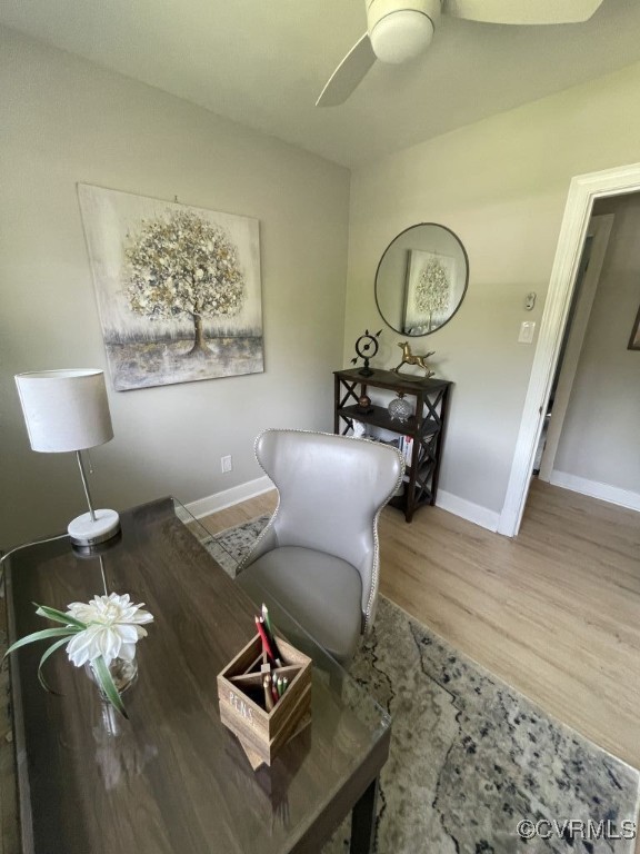 8306 Dade Road Richmond, VA 23227 - Photo 12 of 21 Living area featuring wood finished floors and cei