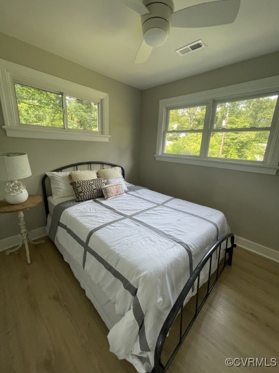 8306 Dade Road Richmond, VA 23227 - Photo 13 of 21 Bedroom with wood finished floors and a ceiling fa