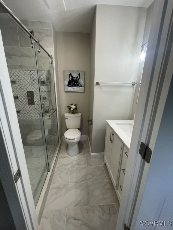 8306 Dade Road Richmond, VA 23227 - Photo 15 of 21 Full bath featuring a shower stall, vanity, and ma