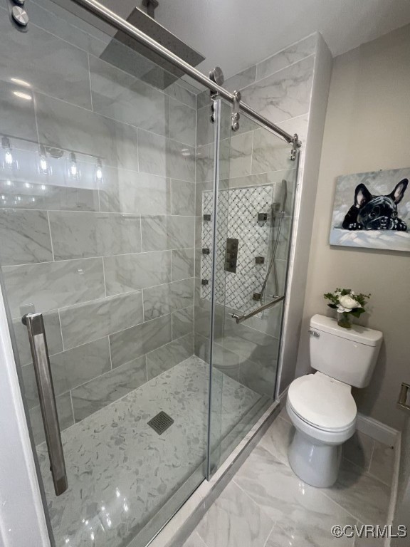 8306 Dade Road Richmond, VA 23227 - Photo 16 of 21 Full bath featuring a shower stall and marble look