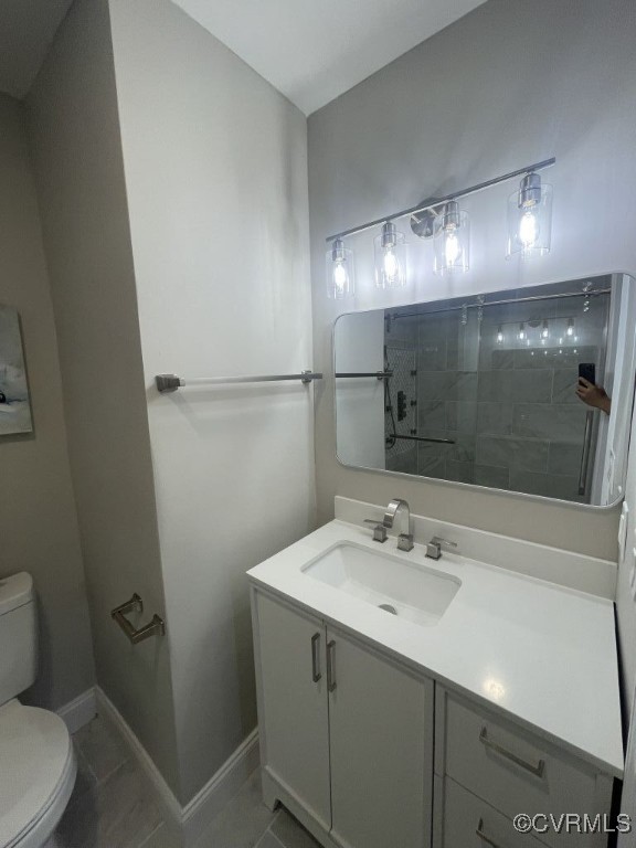 8306 Dade Road Richmond, VA 23227 - Photo 17 of 21 Full bathroom featuring vanity and a tile shower