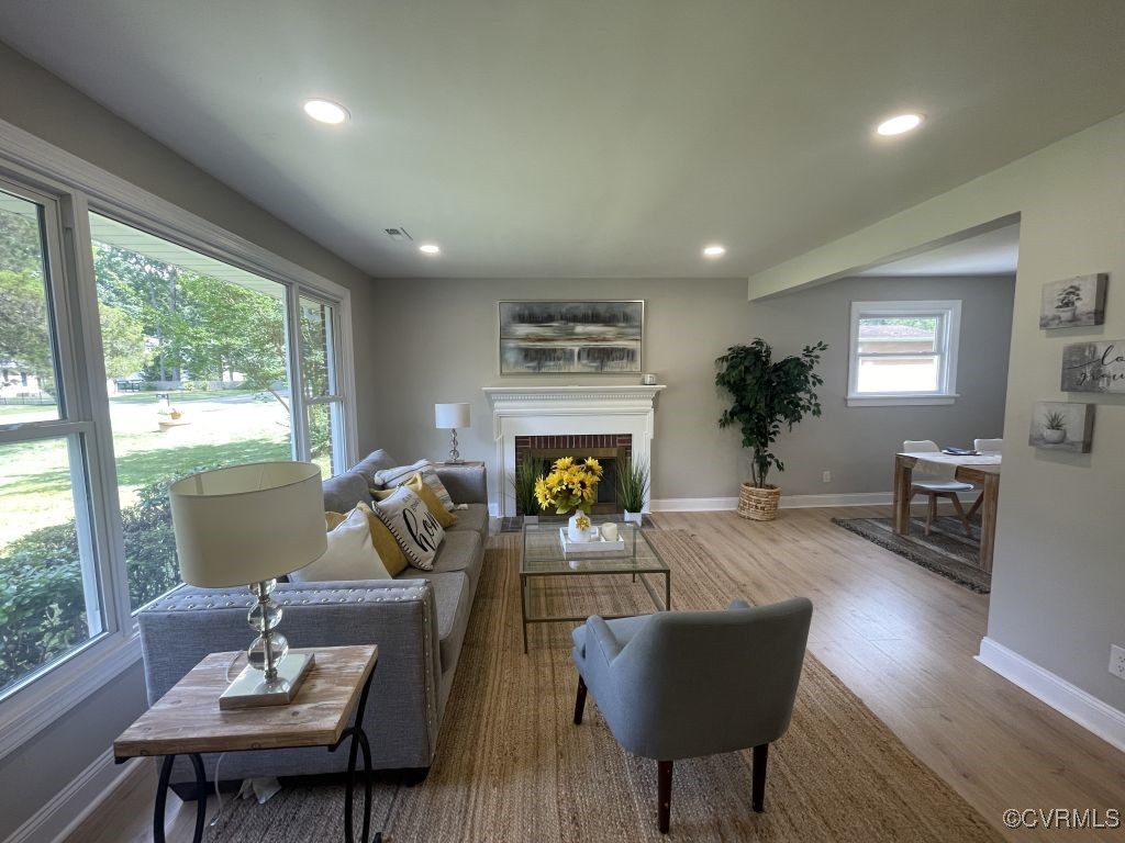 8306 Dade Road Richmond, VA 23227 - Photo 3 of 21 Living area with wood finished floors, recessed li
