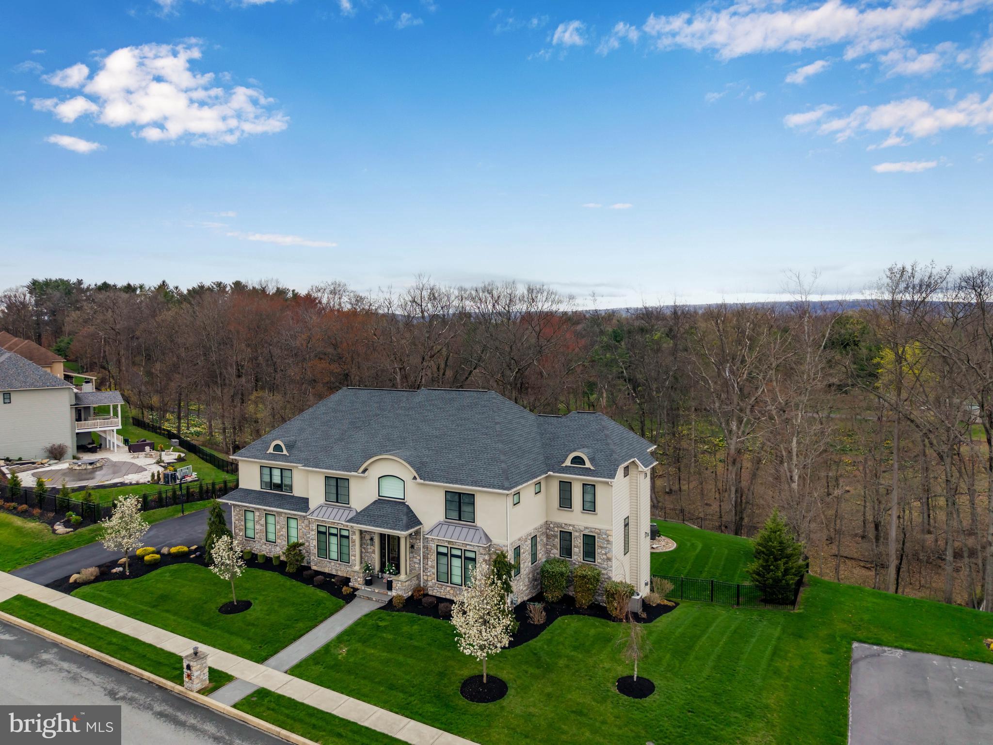 6522 Plowman Ridge Harrisburg, PA 17112 - Photo 11 of 117 a aerial view of a house with a big yard plants and large trees