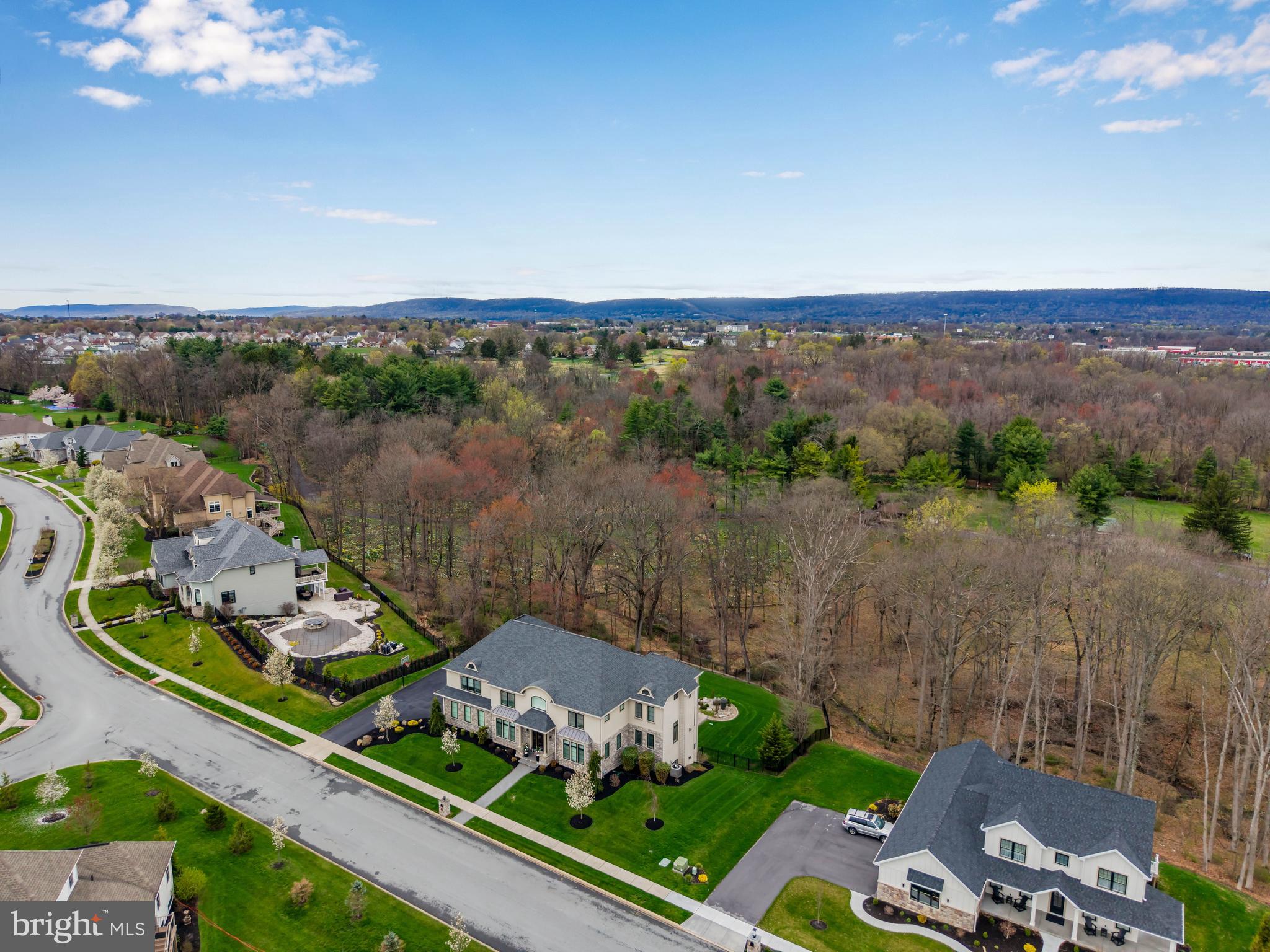 6522 Plowman Ridge Harrisburg, PA 17112 - Photo 12 of 117 an aerial view of a house with a garden and lake view