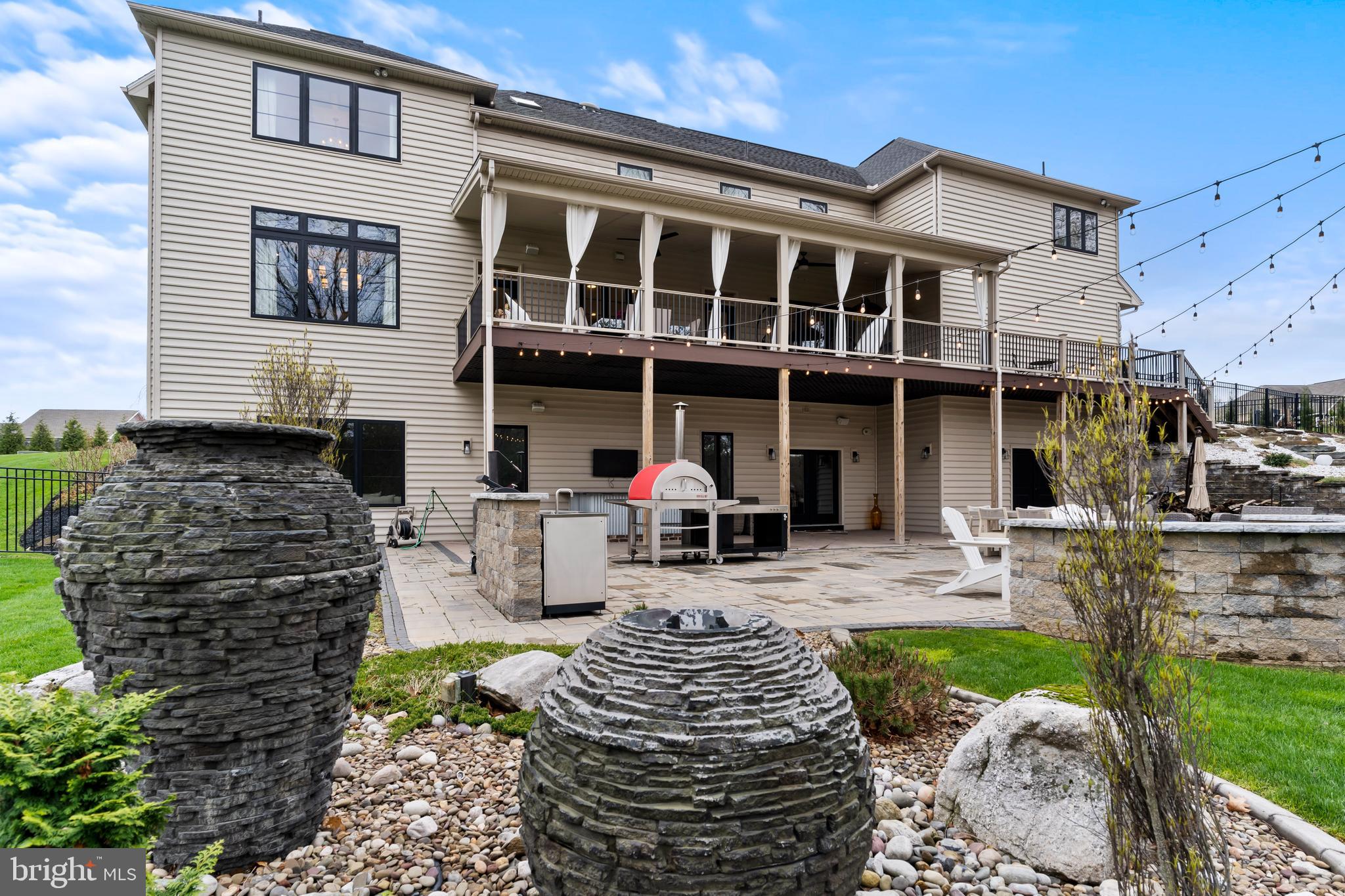 6522 Plowman Ridge Harrisburg, PA 17112 - Photo 20 of 117 a front view of a house with garden and porch