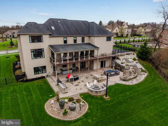 a aerial view of a house with a big yard