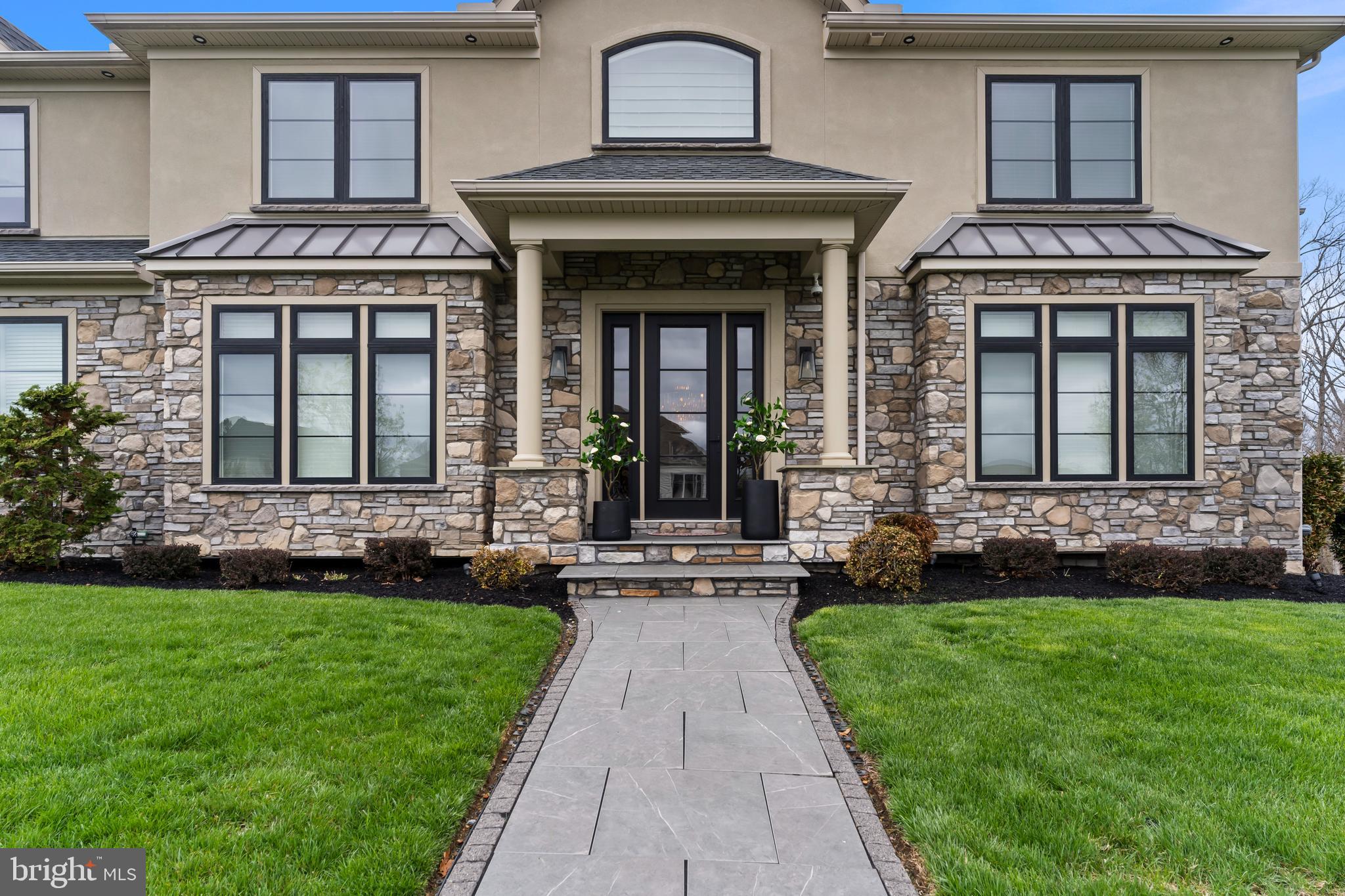 6522 Plowman Ridge Harrisburg, PA 17112 - Photo 23 of 117 a front view of a house with a garden