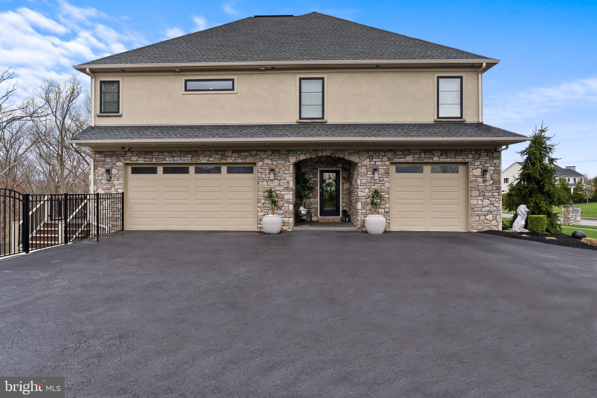 6522 Plowman Ridge Harrisburg, PA 17112 - Photo 26 of 117 a front view of a house with a garage
