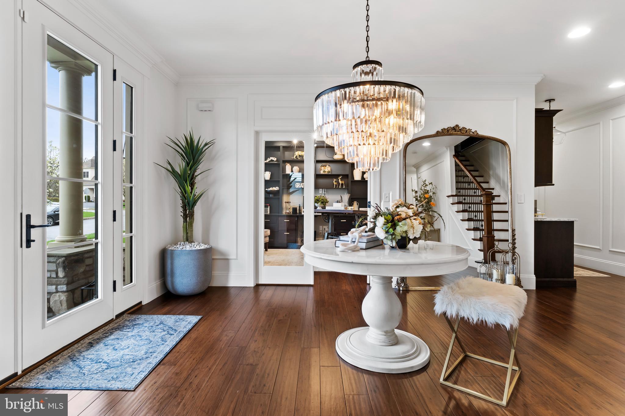 6522 Plowman Ridge Harrisburg, PA 17112 - Photo 28 of 117 a view of a dining room with furniture a chandelier and wooden floor