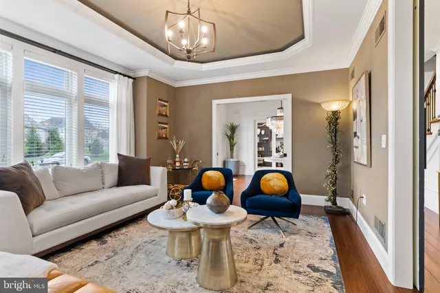 a bedroom with a bed and closet with wooden floor