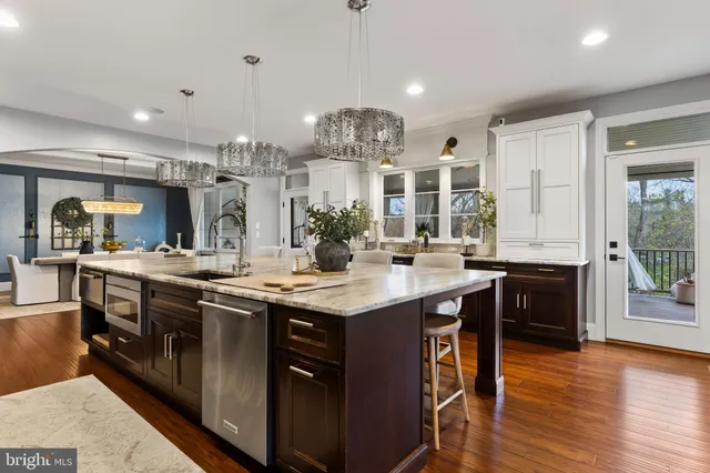 a spacious bedroom with a bed and a couch