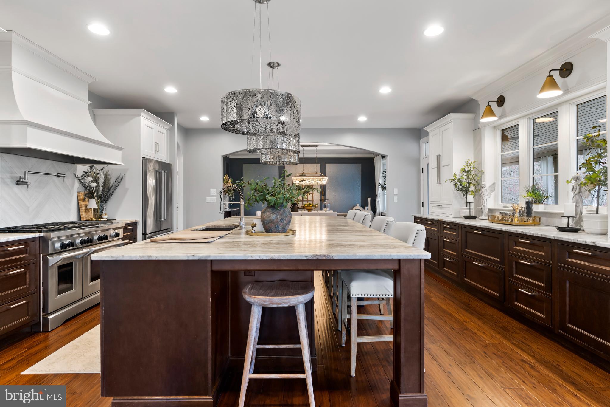 6522 Plowman Ridge Harrisburg, PA 17112 - Photo 42 of 117 a kitchen with kitchen island granite countertop a sink and stainless steel appliances