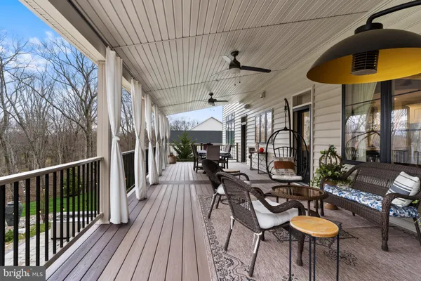 a view of a tables and chairs in a patio
