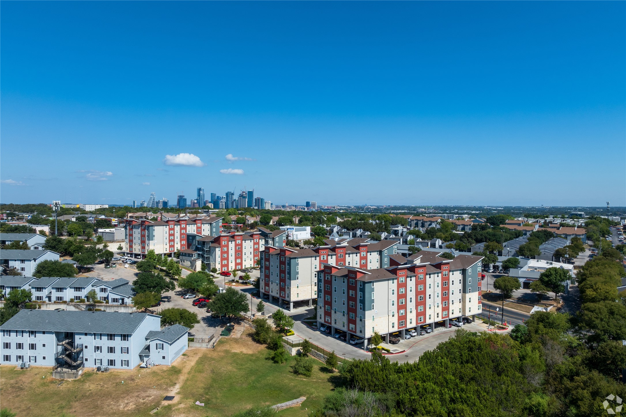 2401 East Oltorf Street, Unit 170 Austin, TX 78741 - Photo 12 of 14 an aerial view of a house with a yard