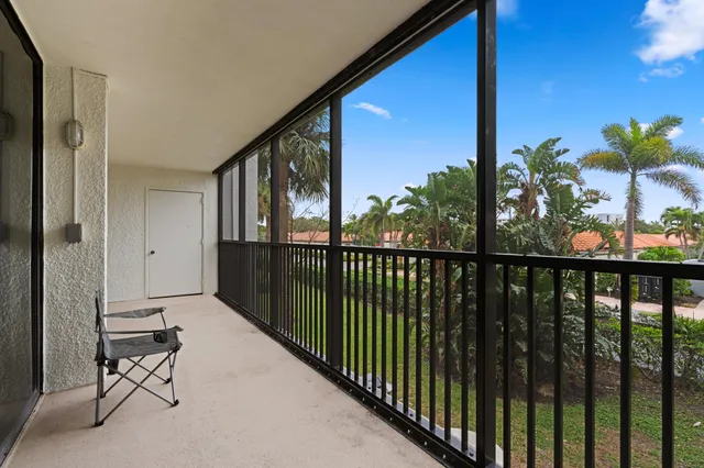 a view of a lake in middle of forest