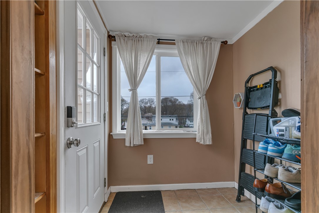 204 Talcott Street Woonsocket, RI 02895 - Photo 17 of 43 Entry way Upstairs enters into Eat in Kitchen
